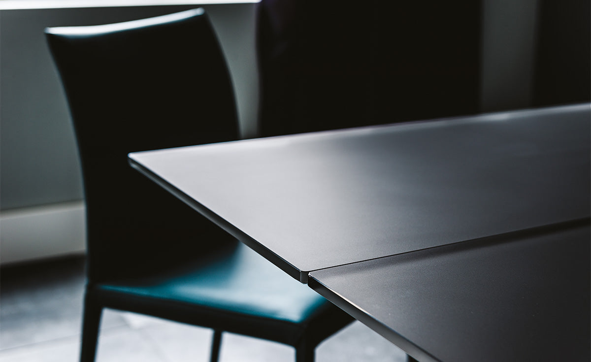 Tavolo Premier Drive - base in acciaio e piano in cristallo 12 mm